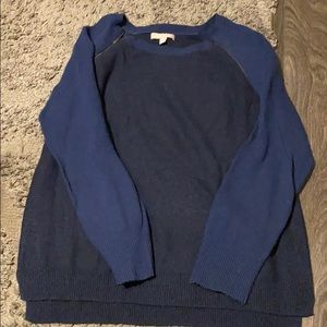 Two tone soft wool sweater with neckline zippers